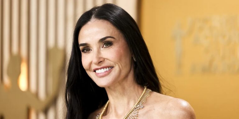 Demi Moore Attends the 2025 Met Gala in Striped Black Gown — Photos