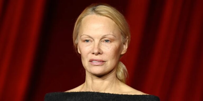 Pamela Anderson, 57, Dazzles in Silver-Sequined Dress & ‘Baby Bangs’ at the 2025 Met Gala – Photos